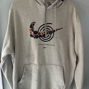 Nike Tan Sweatshirt with Bold Graphic Design